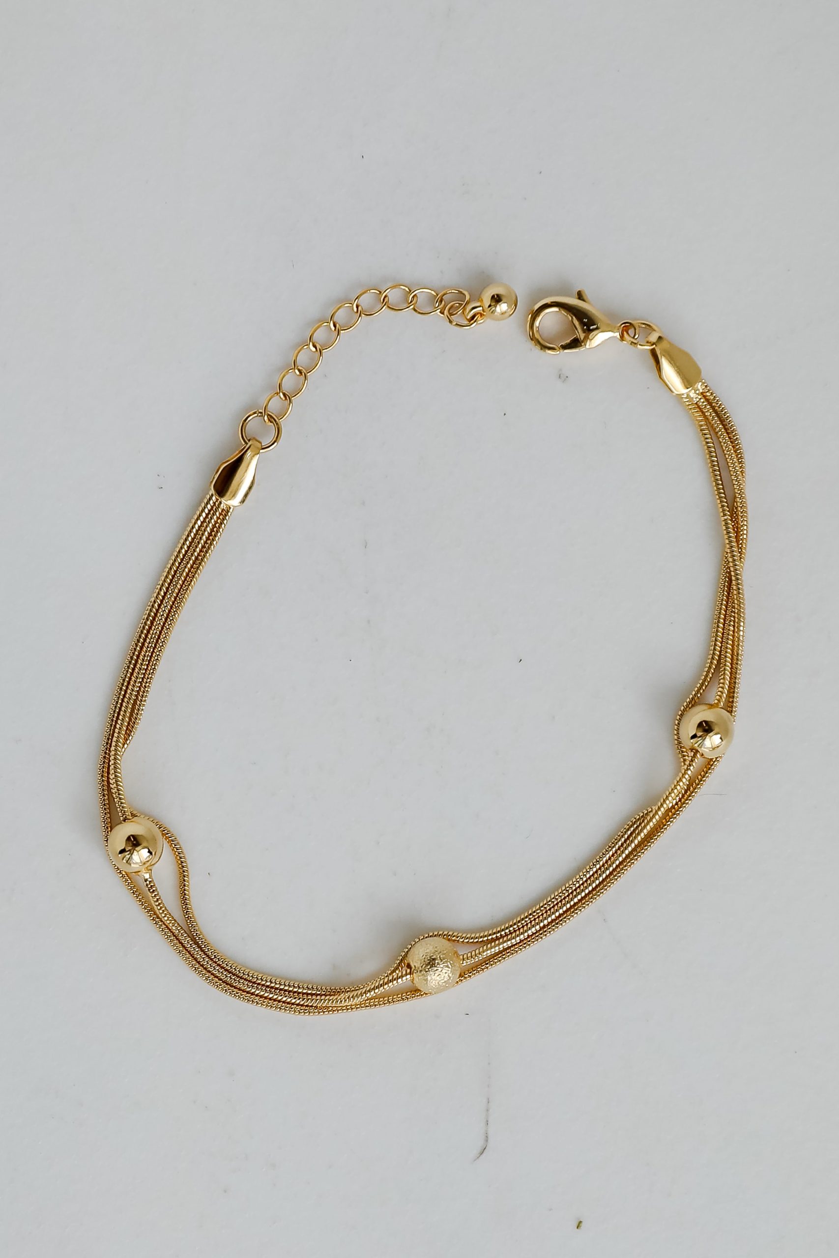 shopdressup_gold_ball_bracelet-2.jpg